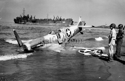 #ad WW2 Picture Photo Italy 1943 Supermarine Spitfire of the US 307th on beach 2051