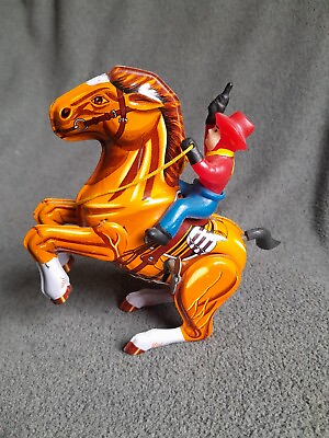 #ad Vintage Tin Litho Working Mechanical Tin Cowboy on Horse MTU Korea
