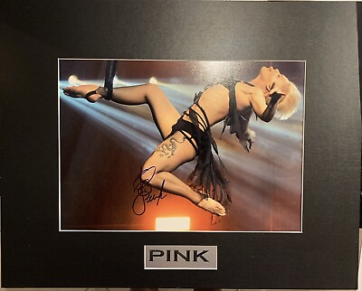 #ad PINK signed 11 X 14 photo and matted to 16x20 w Laser engraved plate. No COA