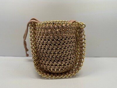 #ad MADISON WEST bucket bag in gold and neutral
