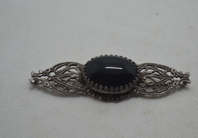 #ad silver tone filigree brooch w black center accent signed Sadie Green N28
