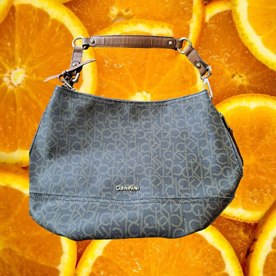 #ad Calvin Klein Monogram Hobo Bag with Side Zipper Pockets