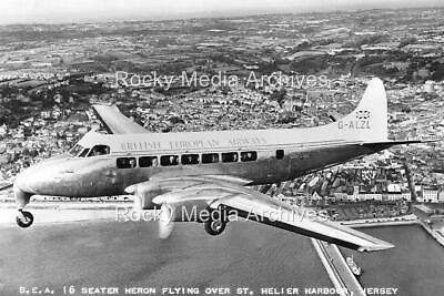#ad Glp 50 BEA British European Heron Aircraft Over St. Helier Jersey. Photo