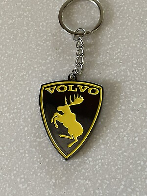 #ad ALL NEW Volvo Prancing Moose Yellow on Smoked Nickel 2” Keychain