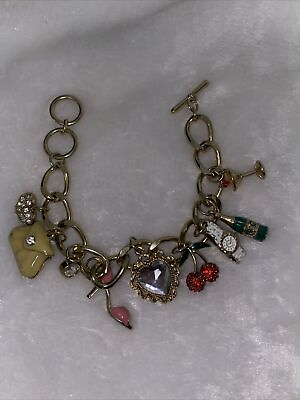 #ad Bracelet with party theme charms 8”