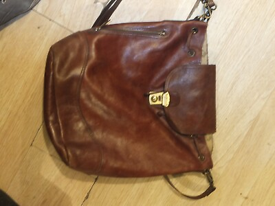 #ad Unisex chestnut brown leather bucket bag.